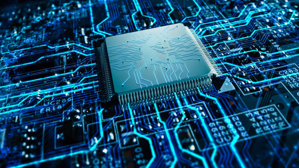 A close-up, high-angle view of a computer circuit board, with a central processor chip surrounded by bright blue glowing circuits.