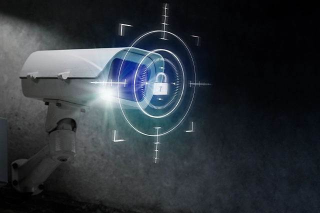 Elevate Technology image of a white bullet security camera with a digital overlay showing a padlock icon inside a target reticle, symbolizing secure surveillance.