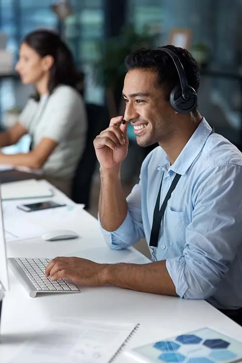 IT support professional representing Elevate Technology’s managed IT services and cybersecurity support for Houston businesses.