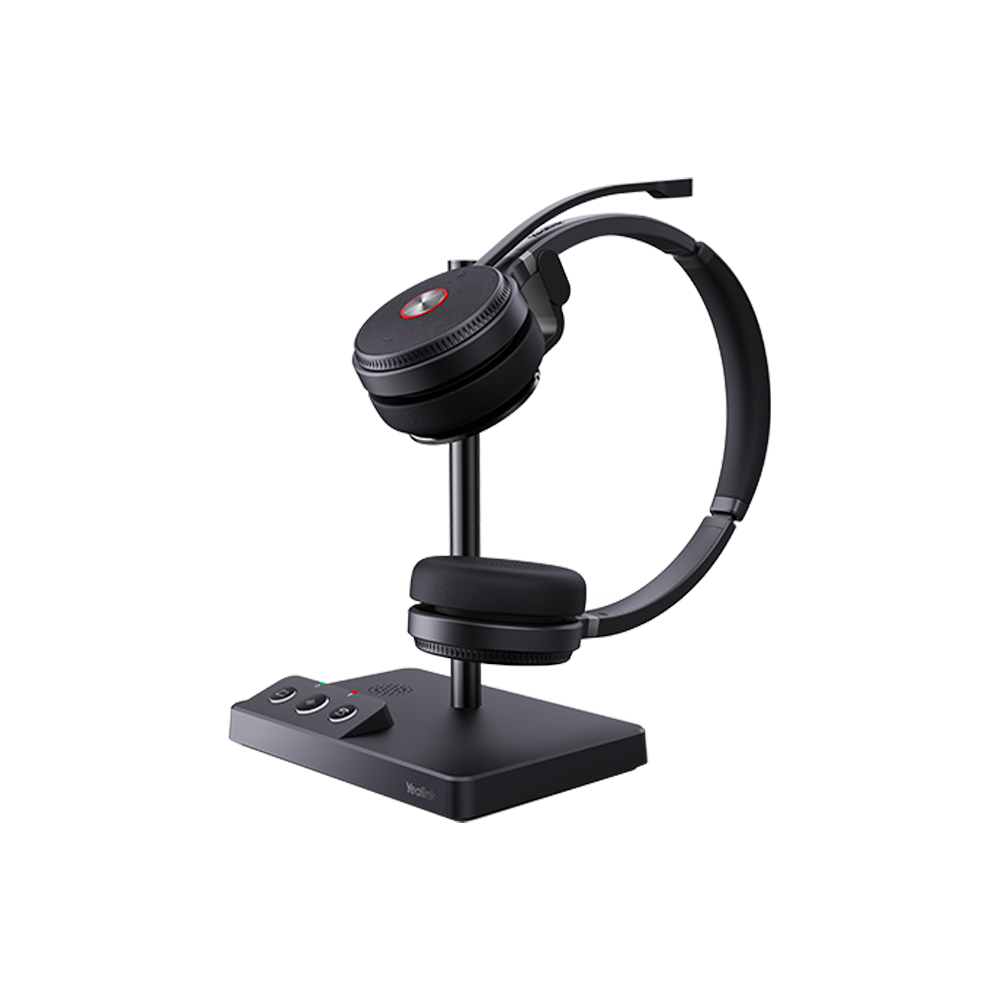 The best headset for office communication, the Yealink WH62, with a noise cancelling headphones feature and a compact charging base.