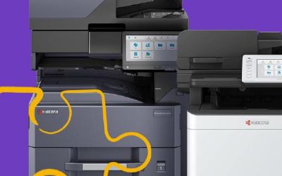 Elevate Technology close-up of a stack of black and white Kyocera multi-function printers/copiers, with a partial yellow squiggle graphic on a purple background.