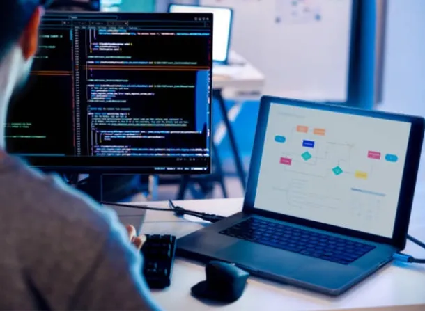 A professional stock photo for Elevate Technology showing a developer or IT professional working.
