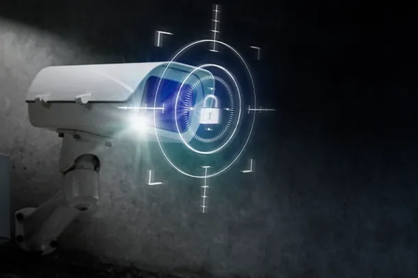 Elevate Technology image of a white bullet security camera with a digital overlay showing a padlock icon inside a target reticle, symbolizing secure surveillance.