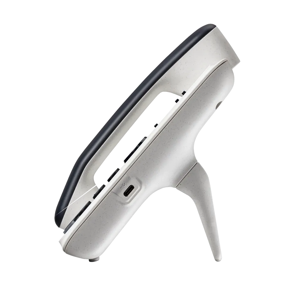 Polycom E100 VoIP desk phone sideview featuring a 2.8-inch color IPS LCD, Dual GigE Ethernet ports with PoE, and integrated Microban® antimicrobial protection.